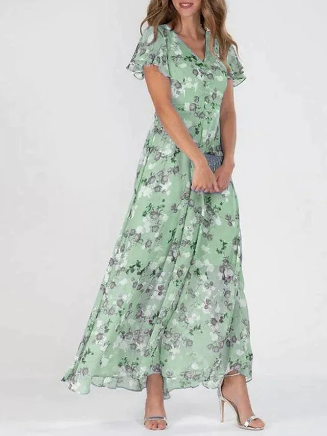 Siv™ | Feminin blommig klänning med eleganta volangärmar