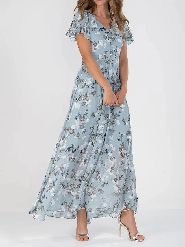 Siv™ | Feminin blommig klänning med eleganta volangärmar