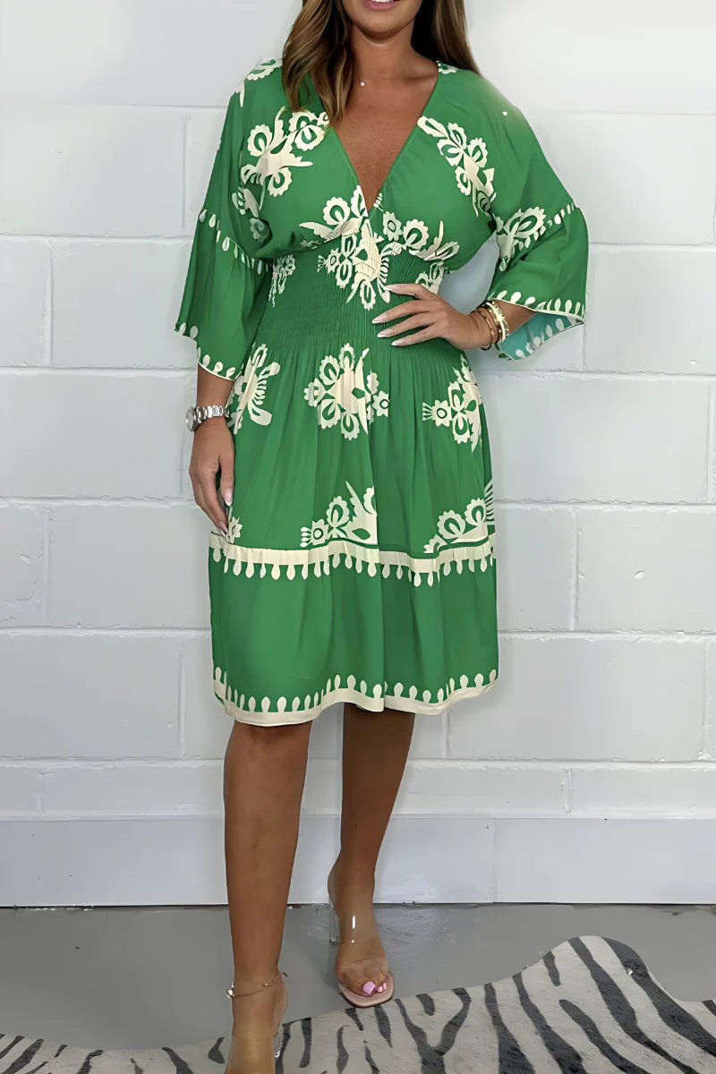 Elena™ | Kort bohemisk klänning med smickrande skärning och blommönster