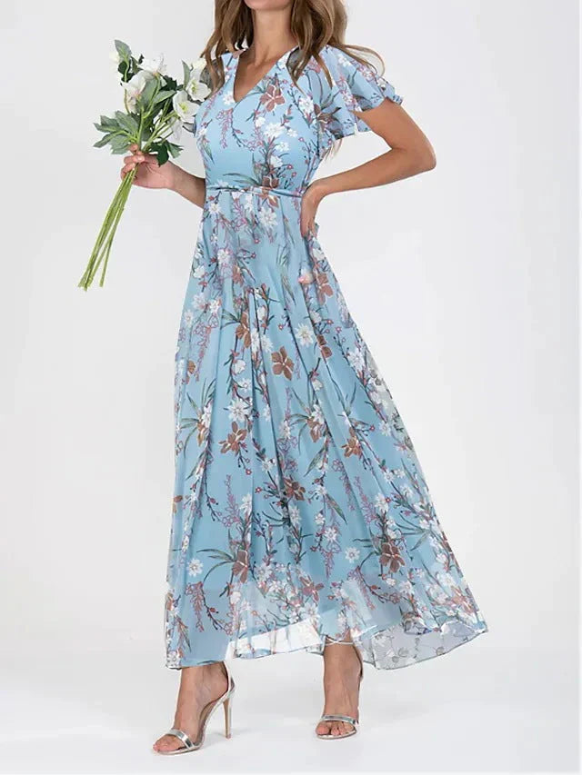 Siv™ | Feminin blommig klänning med eleganta volangärmar