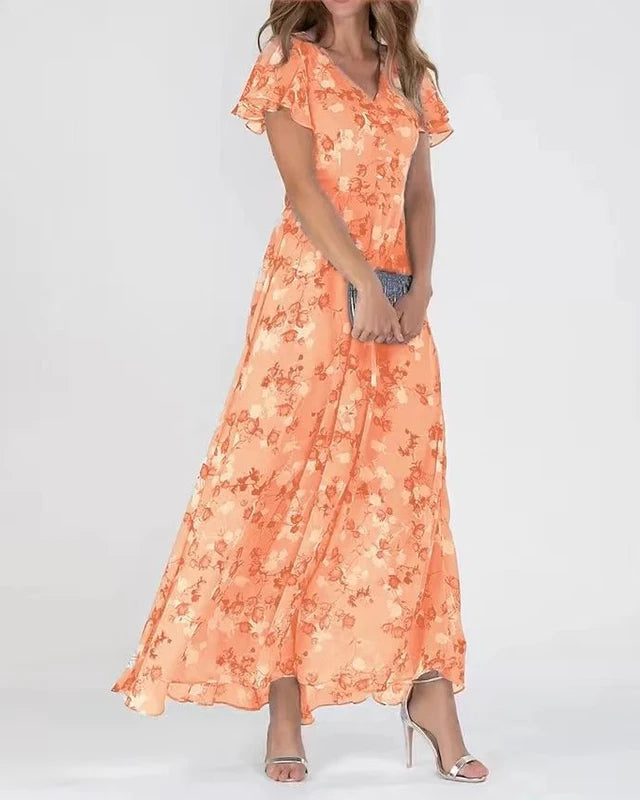 Siv™ | Feminin blommig klänning med eleganta volangärmar