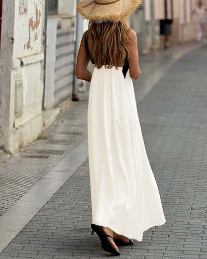 Judit™ | Elegant sommarklänning med halterneck och luftig passform