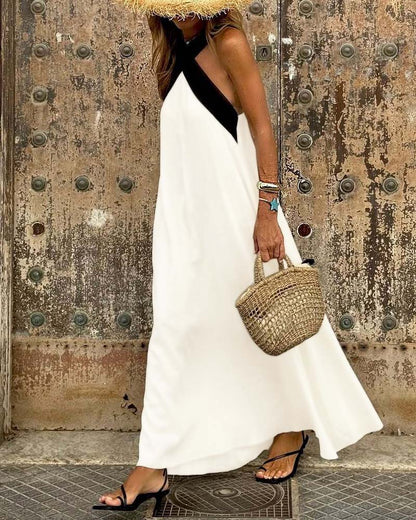 Judit™ | Elegant sommarklänning med halterneck och luftig passform