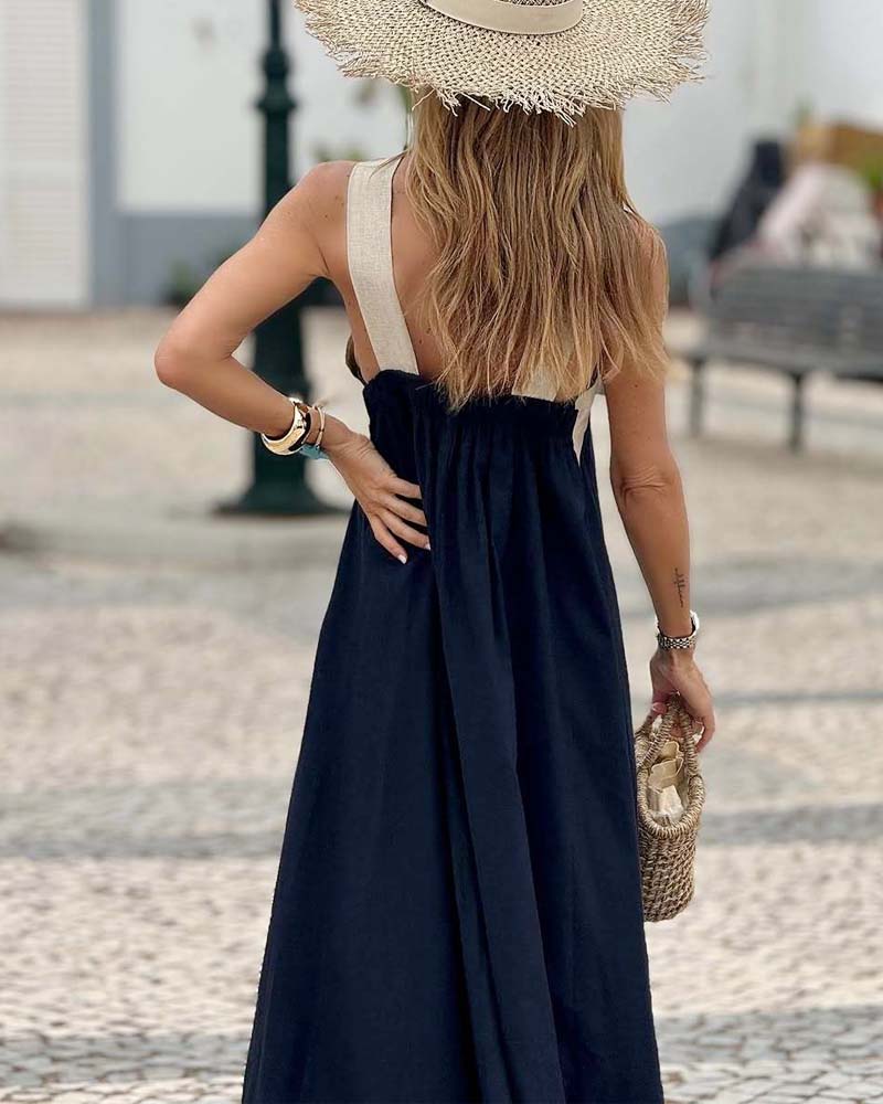 Judit™ | Elegant sommarklänning med halterneck och luftig passform