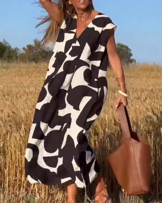 Serena™ | Elegant klänning med V-ringning och feminin stil